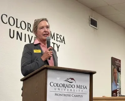 Kathleen Curry speaks at The Forum in Montrose on October 9, 2024